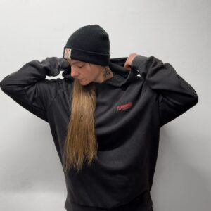 „BUILT BY WOMEN“ acid-washed oversized hoodie