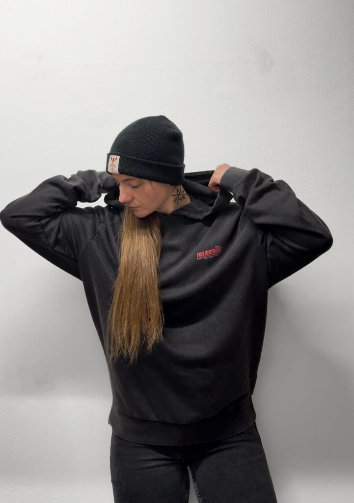 „BUILT BY WOMEN“ acid-washed oversized hoodie